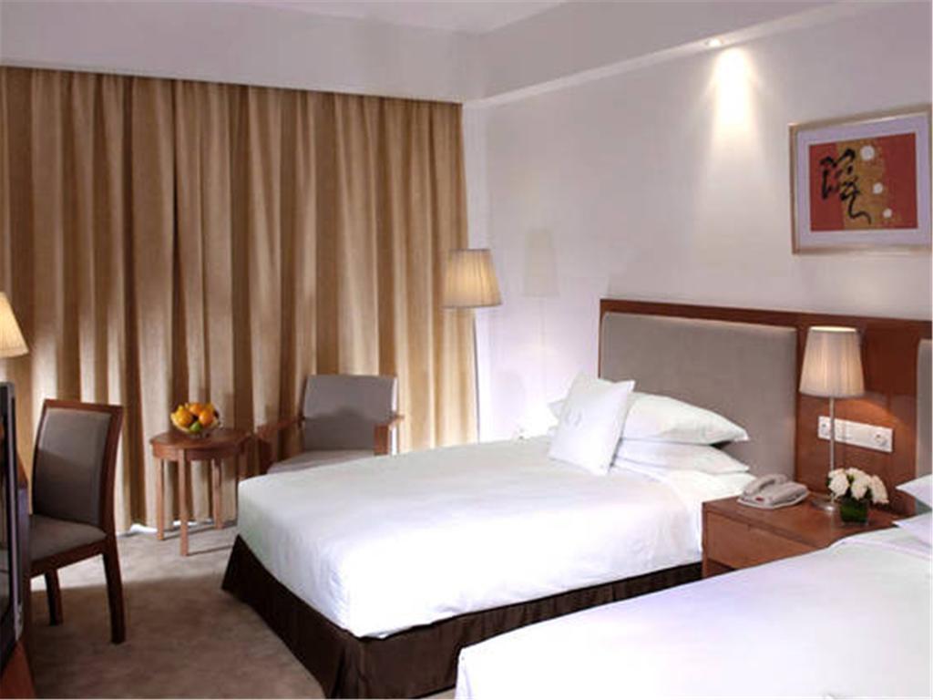Gloria Plaza Hotel Kangqiao Shanghái Exterior foto
