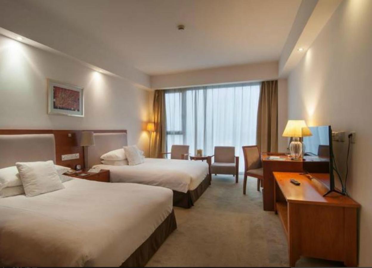 Gloria Plaza Hotel Kangqiao Shanghái Exterior foto