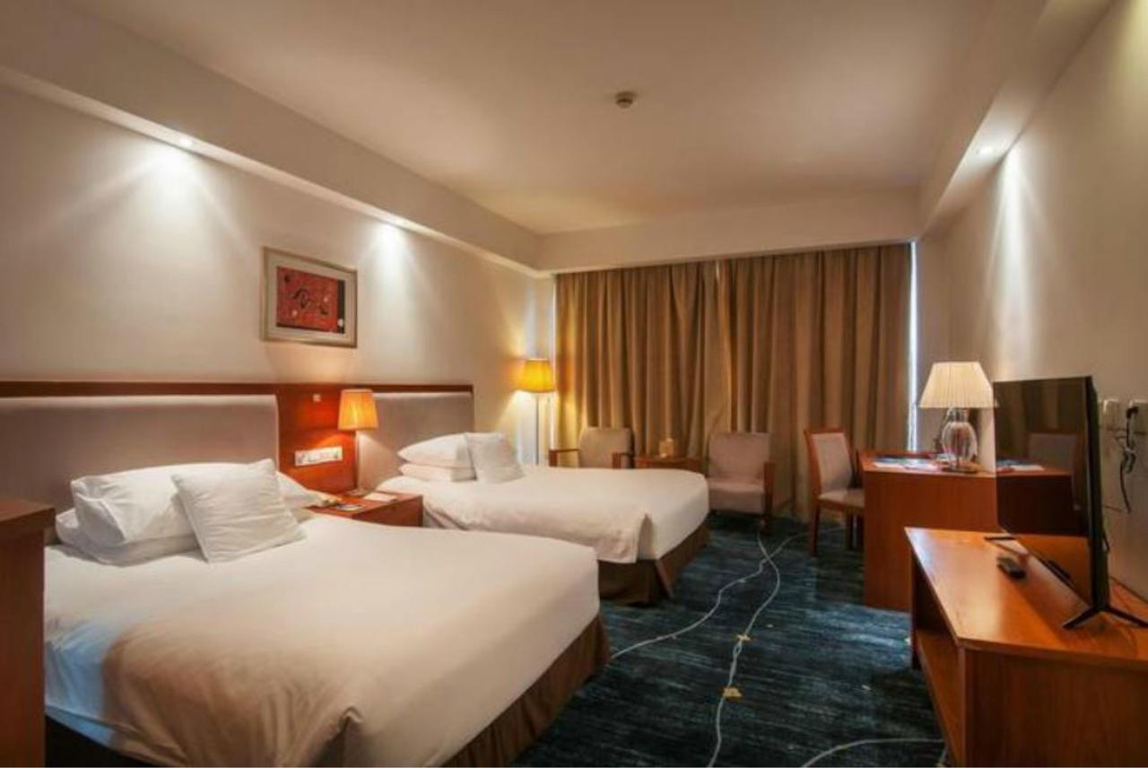 Gloria Plaza Hotel Kangqiao Shanghái Exterior foto